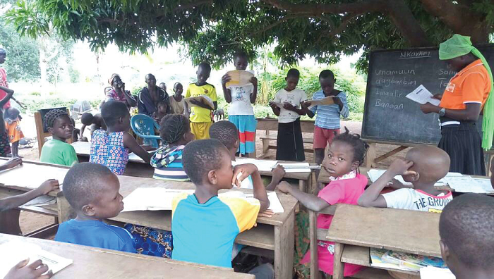 Some out-of-school children going through the CBE programme in Kpandai District in the Northern Region